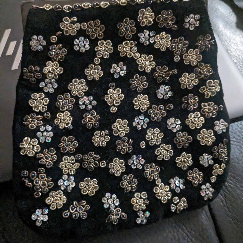 Bcbg small clutch bag with string. Sequined